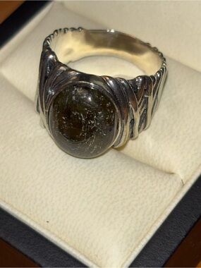Or Paz Sterling Silver Ring with color changing stone.  Box not included.